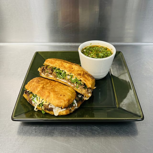 Torta de Birria with Consome.
